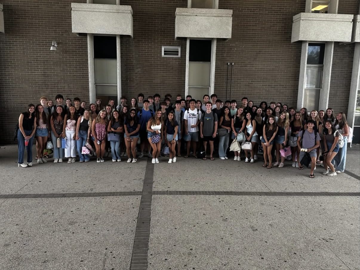 A large group of Hoggard IB students outside the school